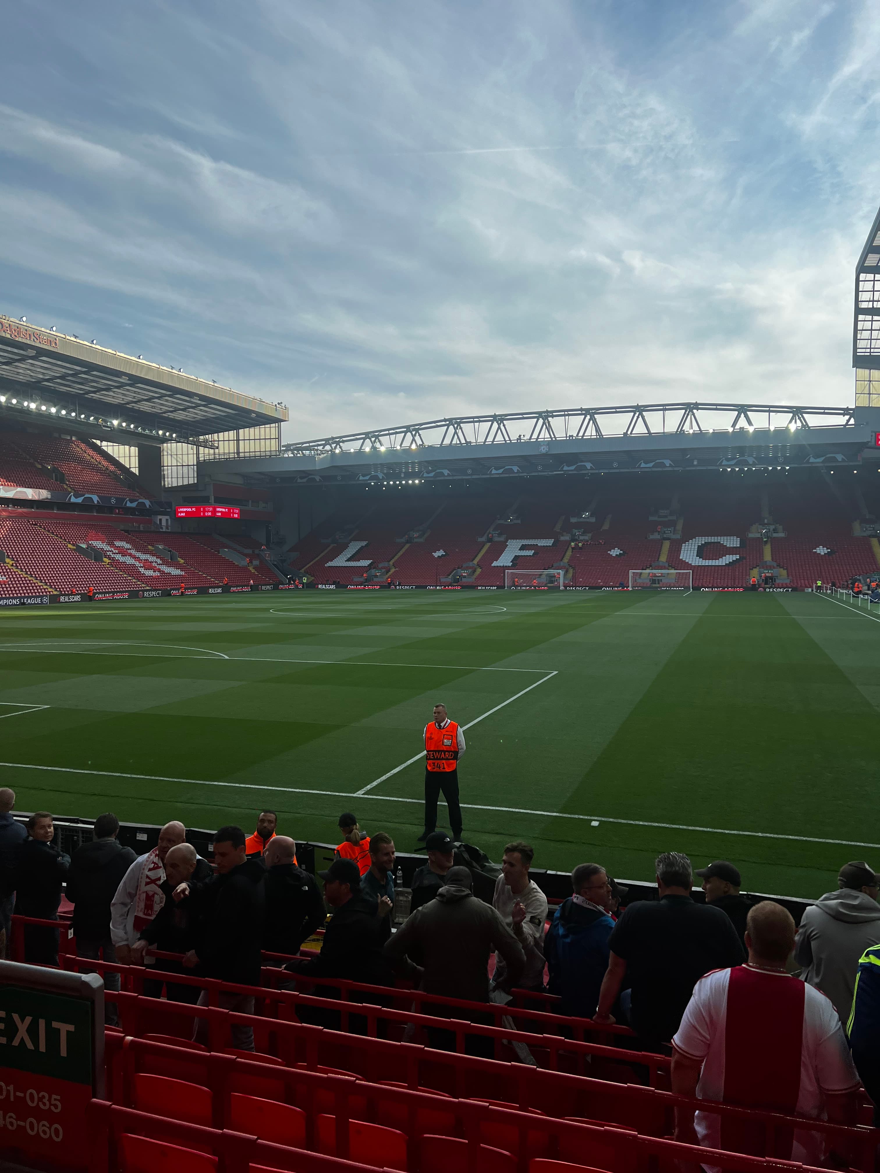 Inside Anfield Stadium pitch view with the Kop stand