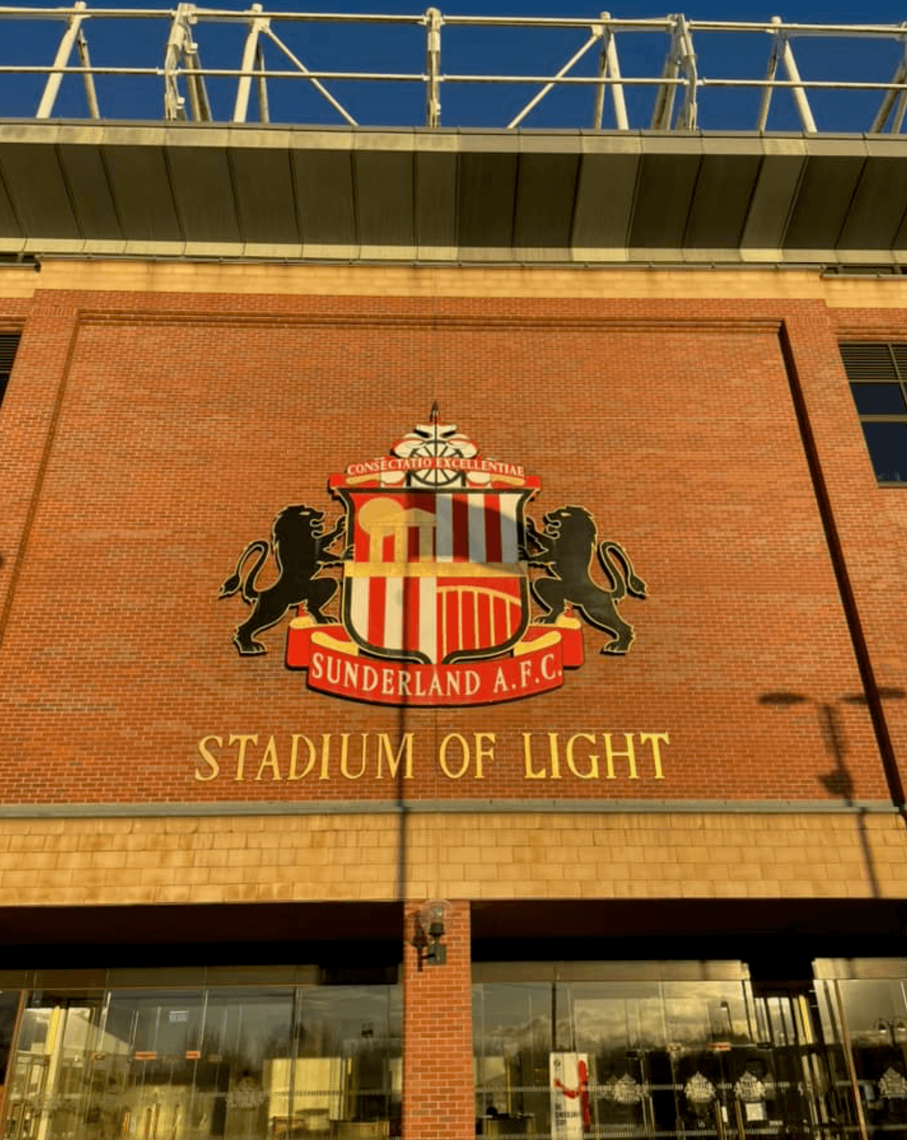 crest-exterior.jpgSunderland AFC crest and Stadium of Light signage on the stadium's brick exterior.
