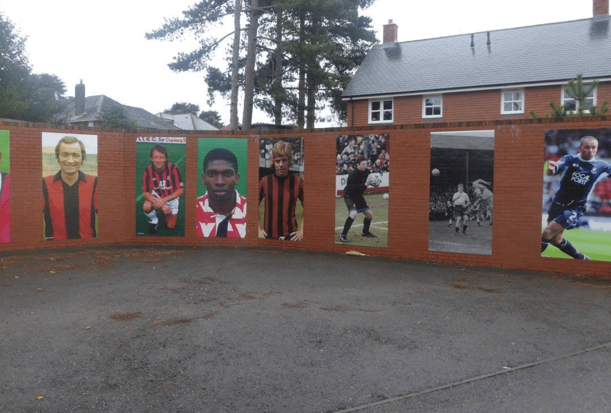 AFC Bournemouth Wall of Fame historic players mural outside Vitality Stadium Dean Court