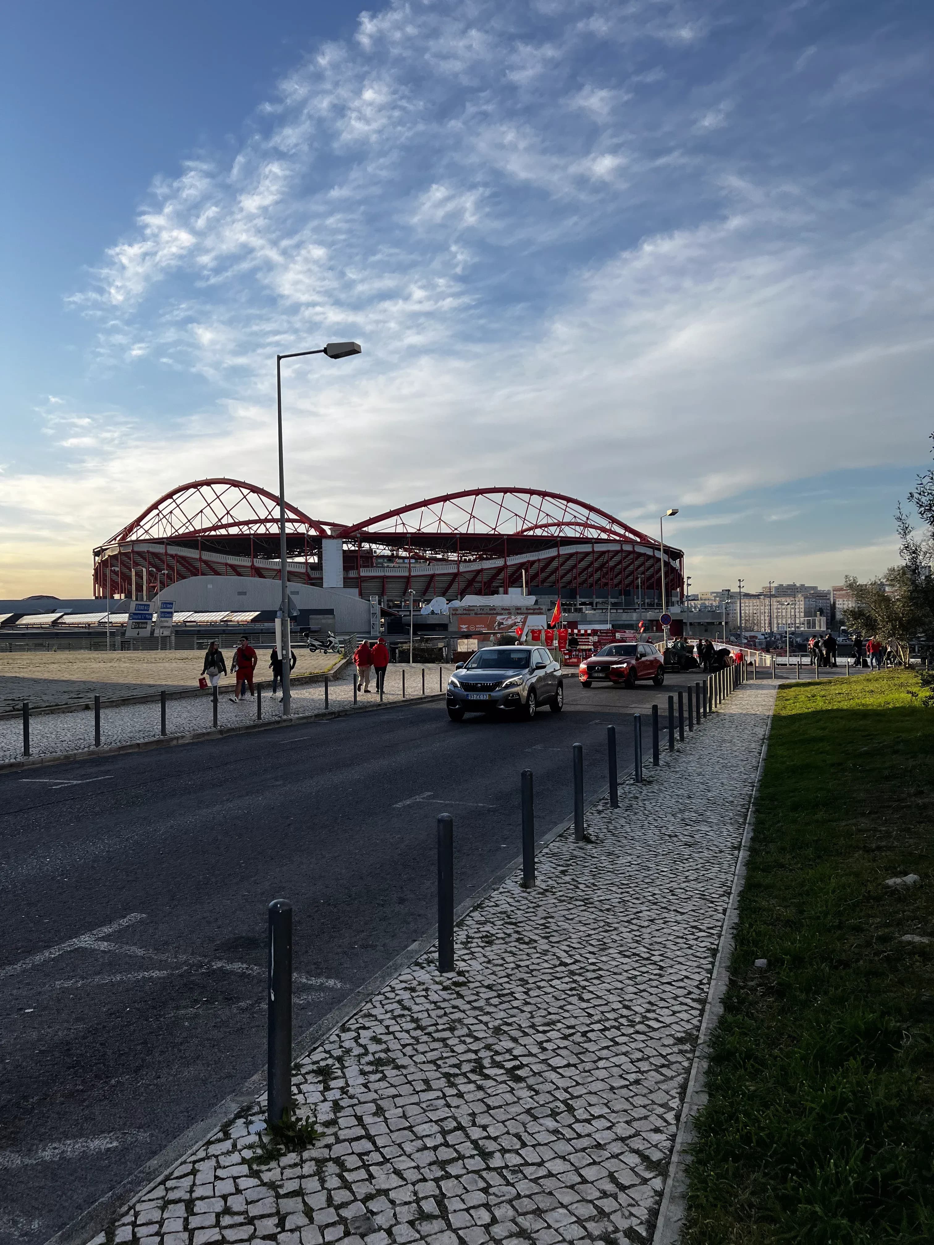 Exterior of Estadio da Luz at daytime on a match day.